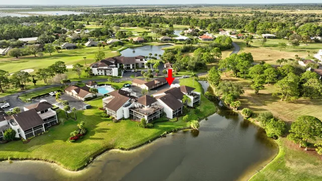 an aerial view of a house with a garden