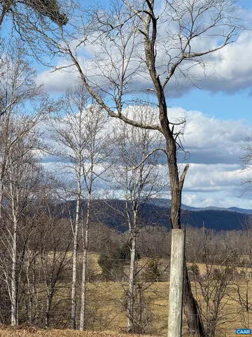 a view of house with outdoor space