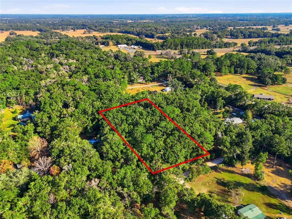 0 Northeast 40th Street Williston, FL 32696 - Photo 3 of 10 an aerial view of a houses with a yard