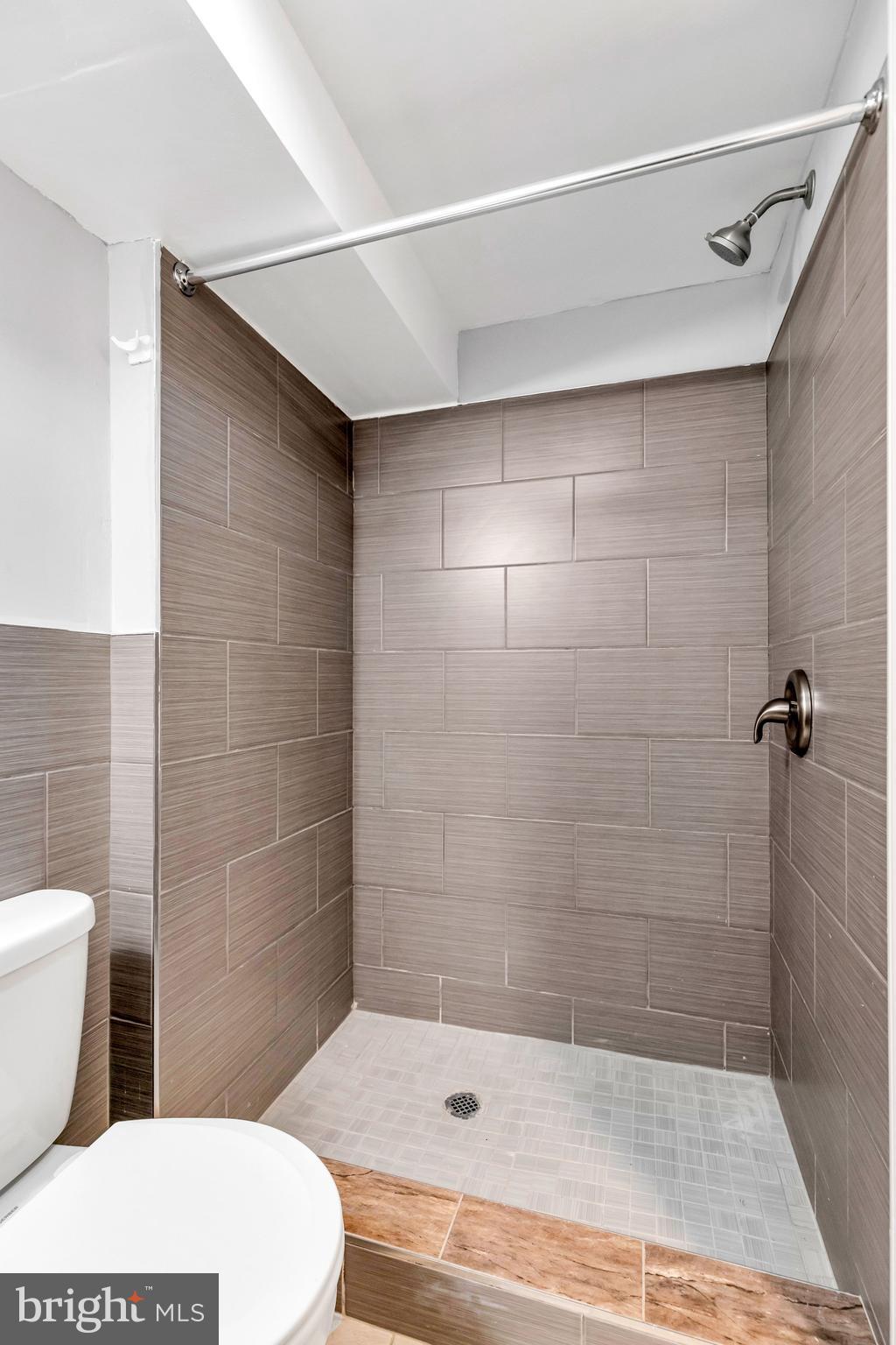 198 Sherbrook Boulevard Upper Darby, PA 19082 - Photo 27 of 30 a bathroom with a shower and a toilet