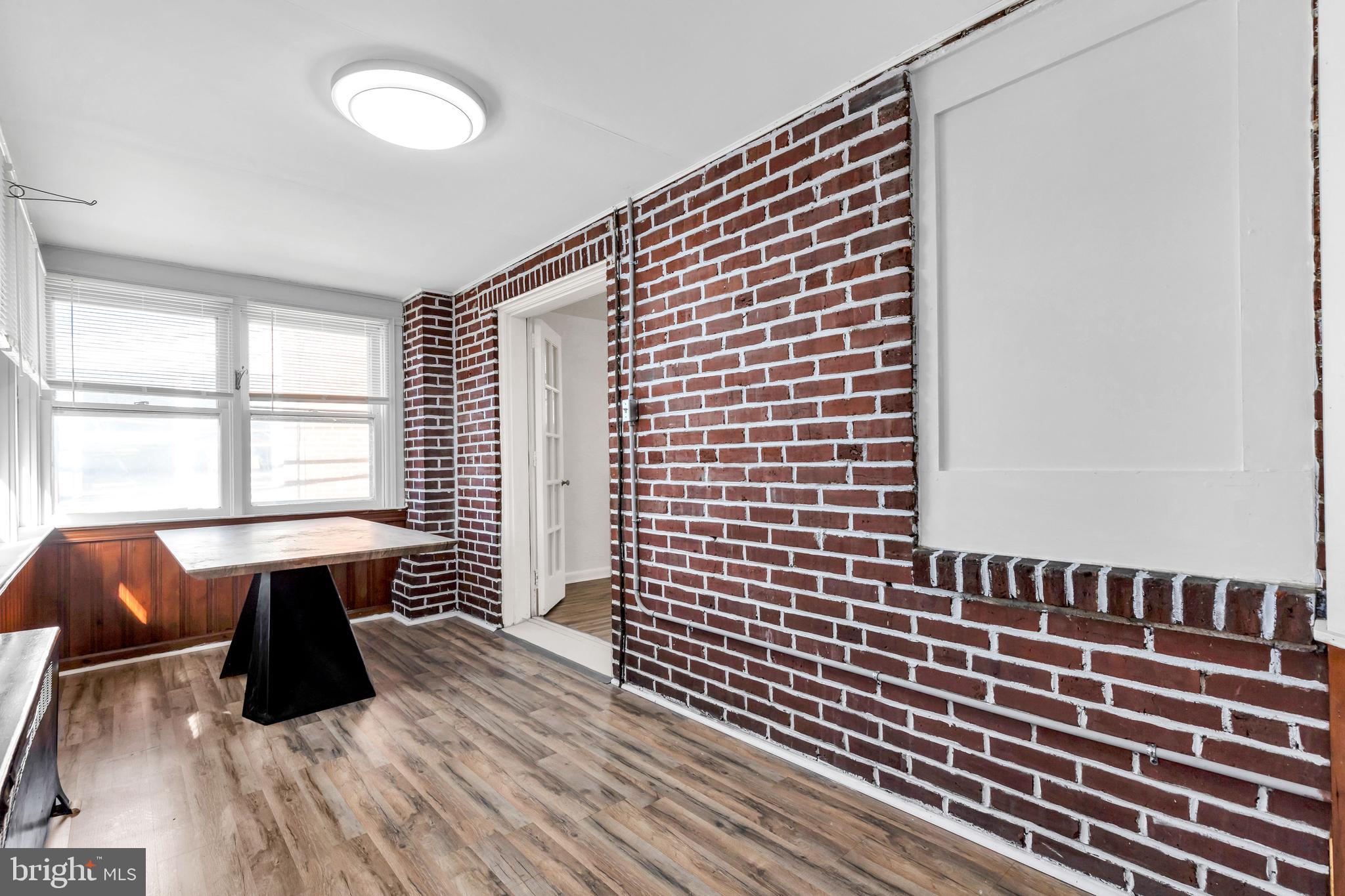 198 Sherbrook Boulevard Upper Darby, PA 19082 - Photo 9 of 30 a room with wooden floor and a window