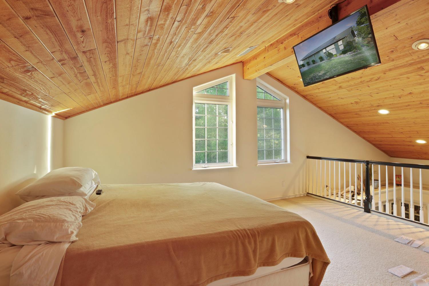 18050 North Tretheway Road Lodi, CA 95240 - Photo 35 of 37 a bedroom with a bed and a window