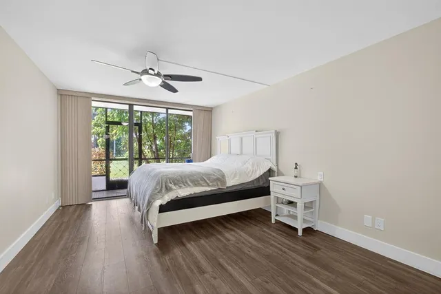 a view of a room with a large window