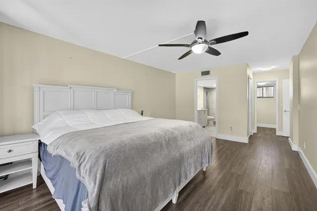 a view of a balcony with wooden floor
