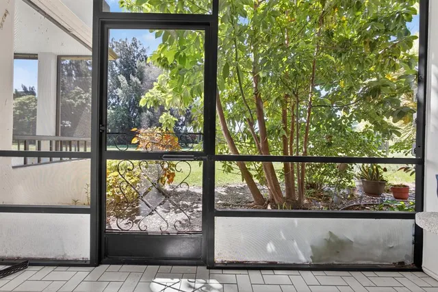 a view of a building with a garden