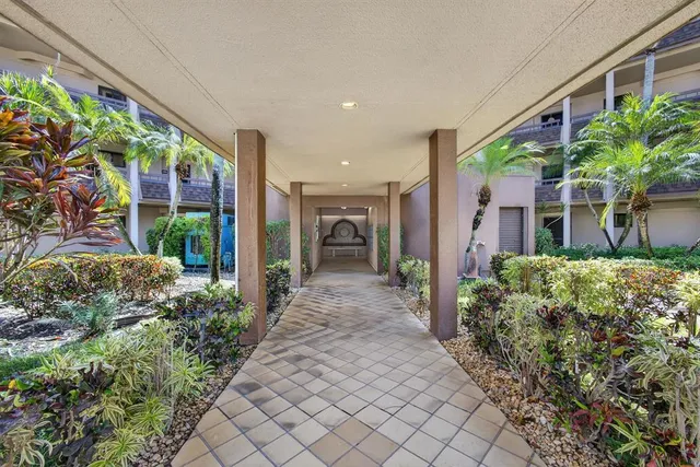 a view of a garden with pathway