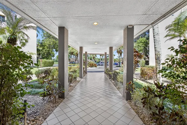 a view of a garden with pathway