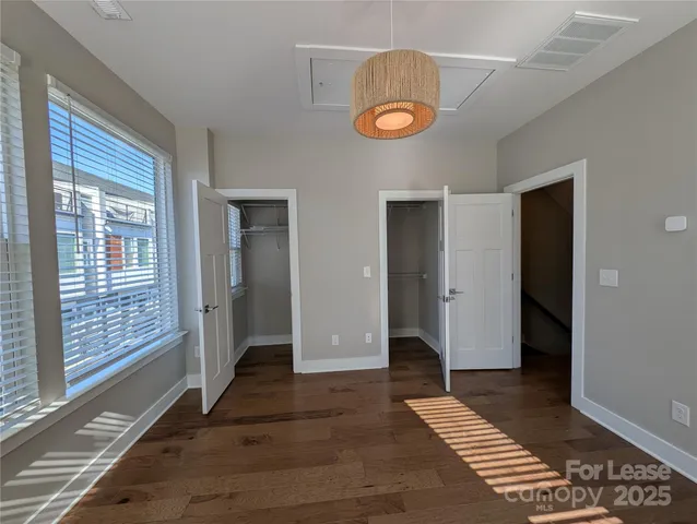 a bathroom with a double vanity sink and mirror