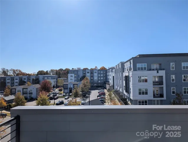 a kitchen with kitchen island a sink stove and refrigerator