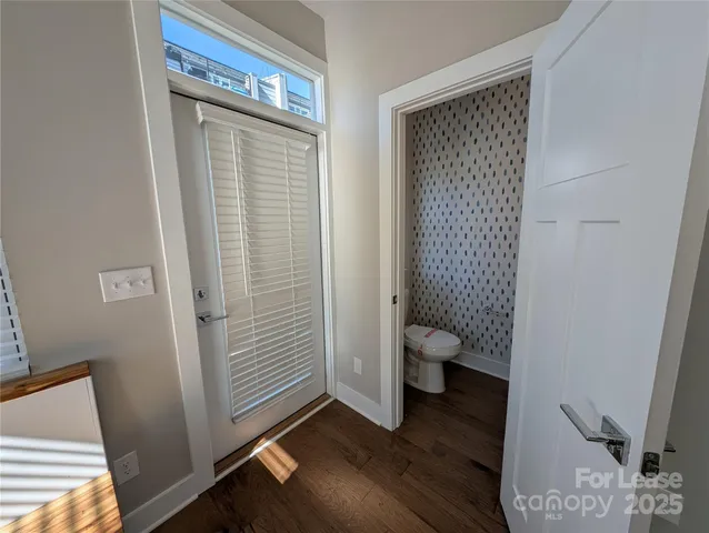 a bathroom with a toilet and a sink