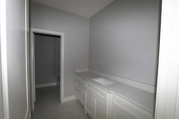 a utility room with a sink