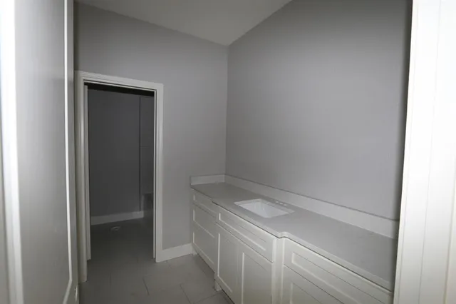 a utility room with a sink