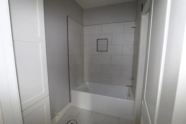 a bathroom with a bathtub
