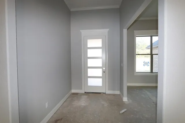 an empty room that has a window