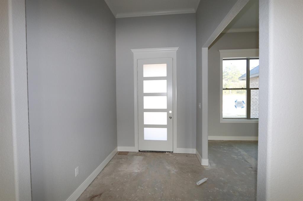 16445 Cooper Way Flint, TX 75762 - Photo 3 of 28 an empty room that has a window