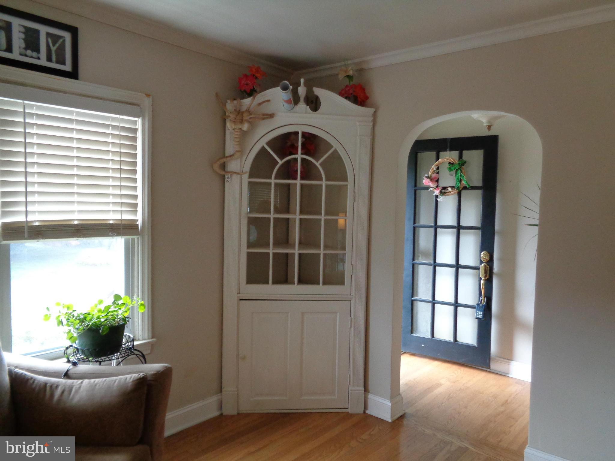 5308 Forge Road White Marsh, MD 21162 - Photo 6 of 26 a view of livingroom with window and wooden floor