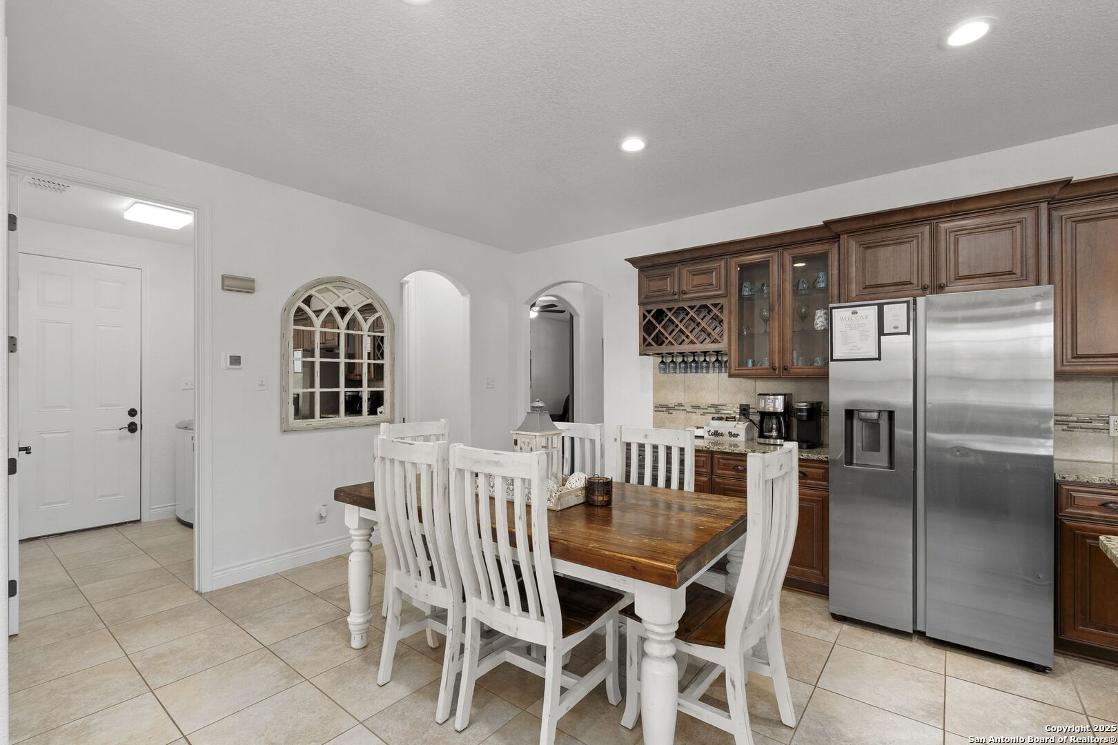 1608 Lake Ridge Boulevard Canyon Lake, TX 78133 - Photo 11 of 46 a view of a dining room with furniture