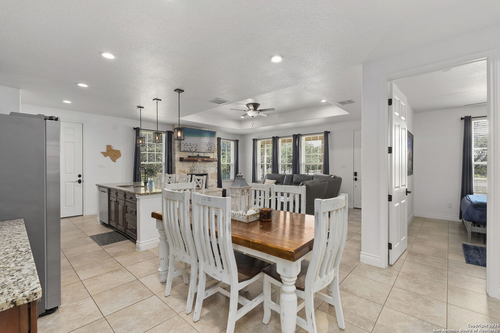 1608 Lake Ridge Boulevard Canyon Lake, TX 78133 - Photo 18 of 46 a view of a dining room with furniture