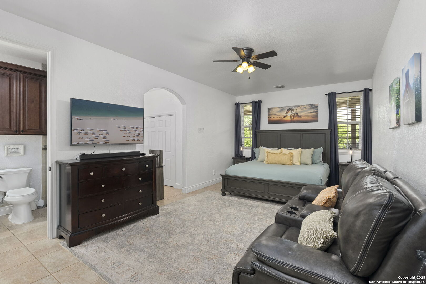 1608 Lake Ridge Boulevard Canyon Lake, TX 78133 - Photo 24 of 46 a living room with furniture and a dresser