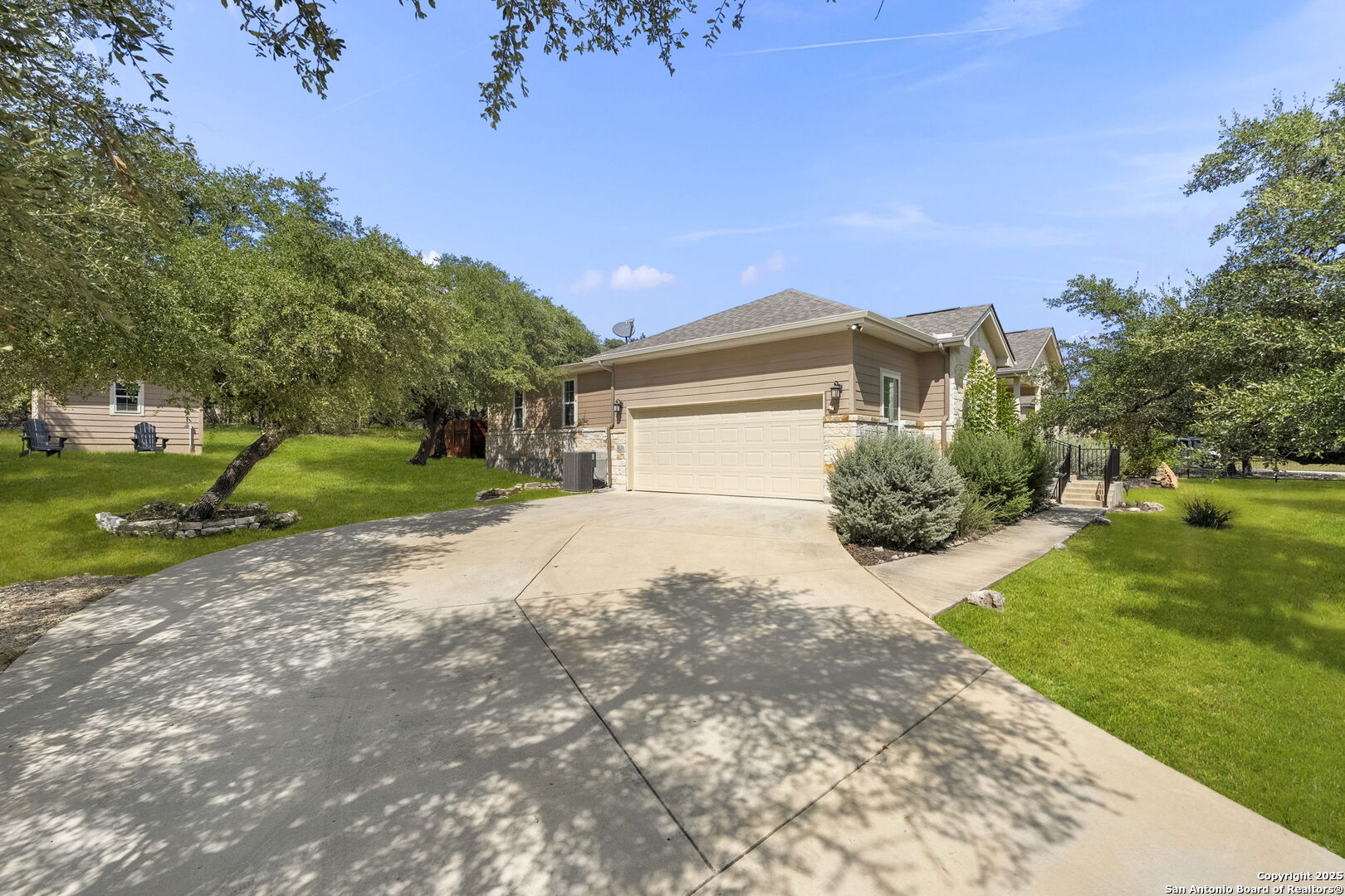 1608 Lake Ridge Boulevard Canyon Lake, TX 78133 - Photo 34 of 46 a view of a house with a yard