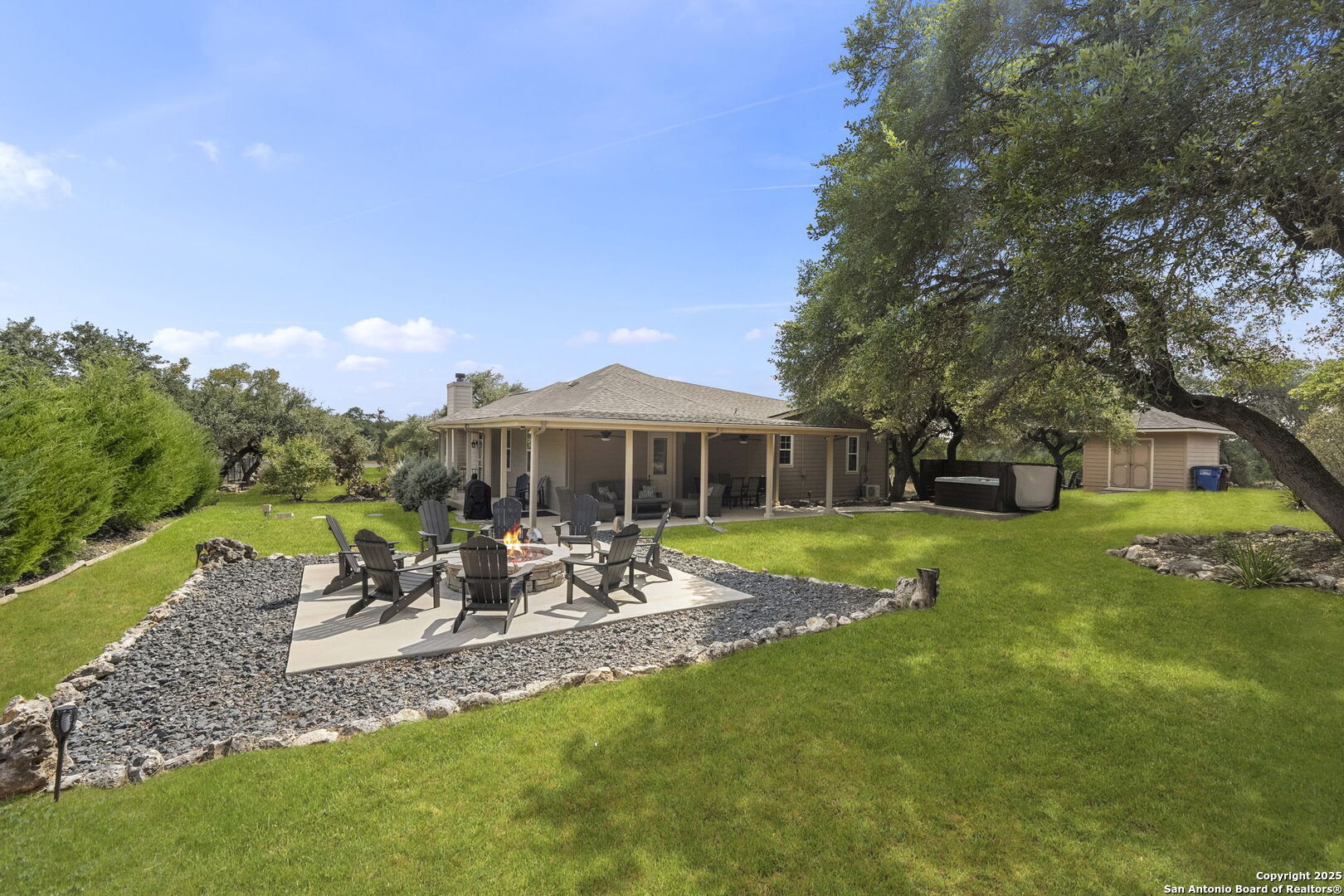 1608 Lake Ridge Boulevard Canyon Lake, TX 78133 - Photo 35 of 46 a front view of a house with garden