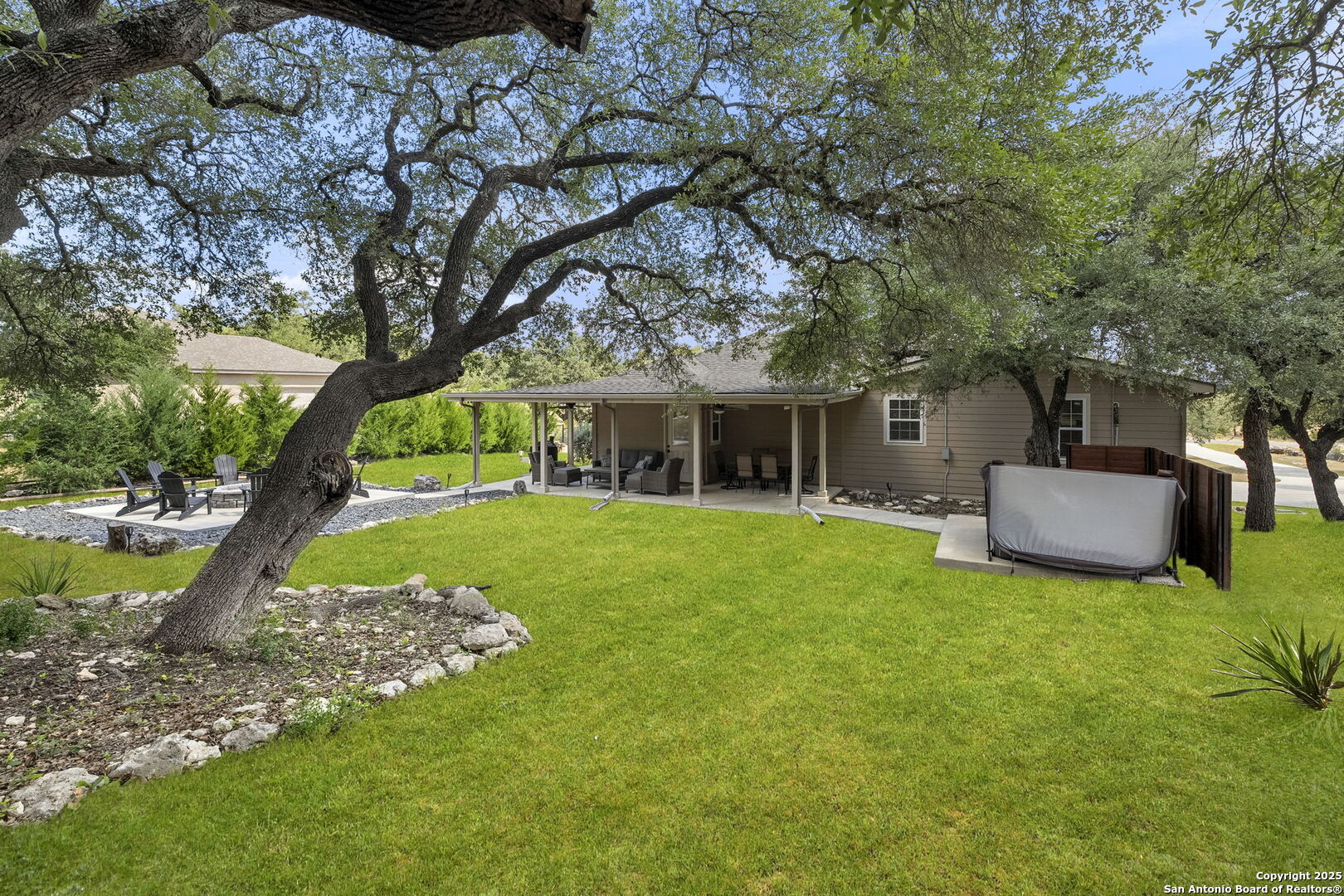 1608 Lake Ridge Boulevard Canyon Lake, TX 78133 - Photo 36 of 46 a house view with a sitting space garden