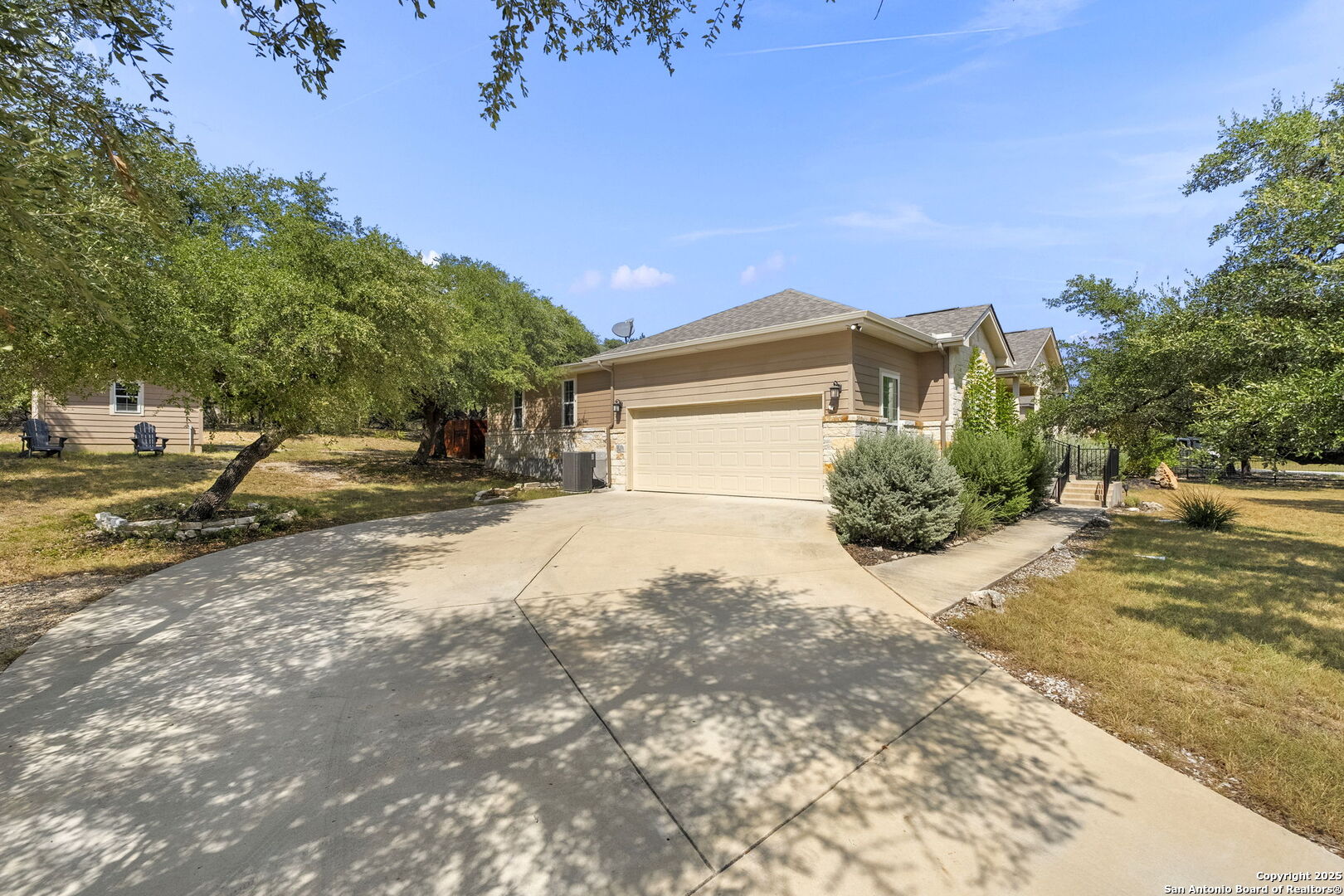 1608 Lake Ridge Boulevard Canyon Lake, TX 78133 - Photo 45 of 46 a view of a house with a yard and tree s