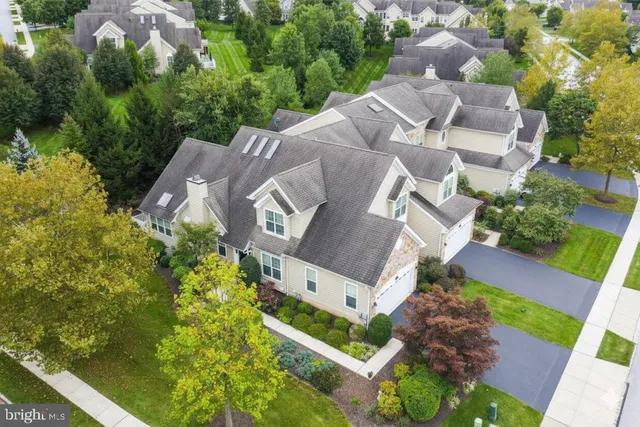 a bed room with a bed and a window