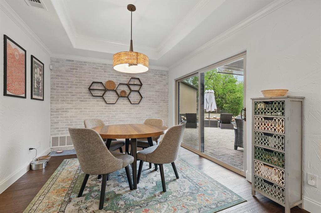 5657 Harmony Ranch Road Aubrey, TX 76227 - Photo 15 of 40 a view of a dining room with furniture window and outside view