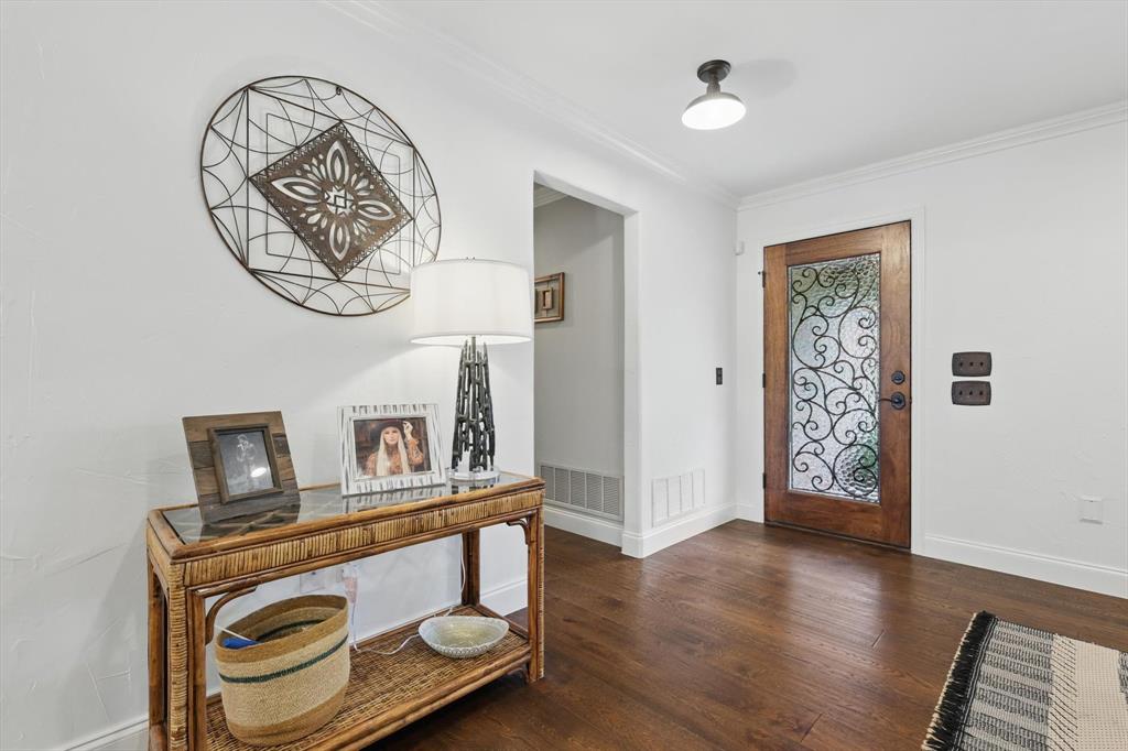5657 Harmony Ranch Road Aubrey, TX 76227 - Photo 4 of 40 a view of a hallway with elevator