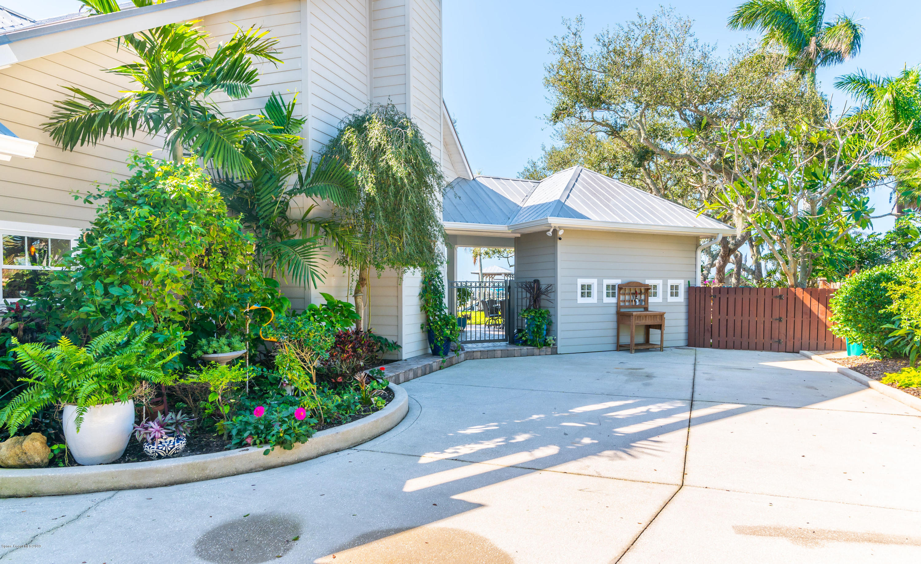 800 South Riverside Drive Indialantic, FL 32903 - Photo 24 of 54 Driveway