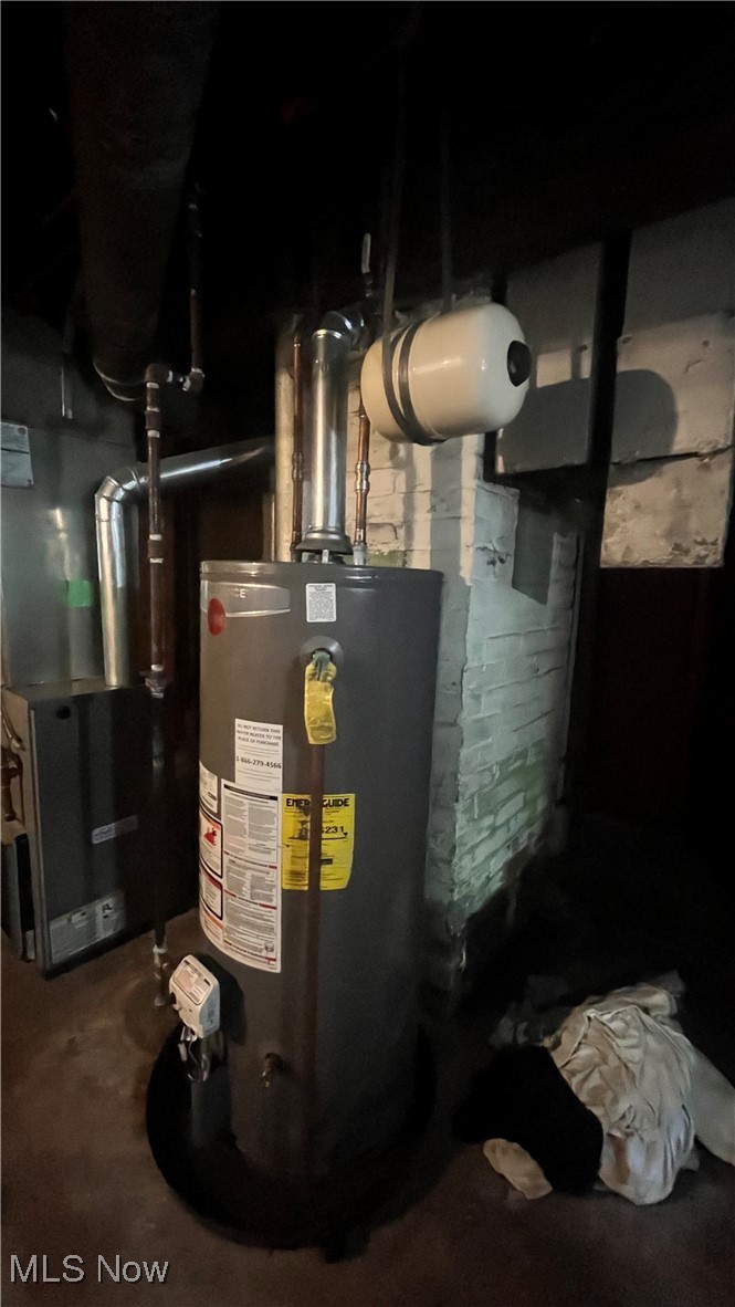 13818 Coit Road Cleveland, OH 44110 - Photo 4 of 5 Utility room with gas water heater