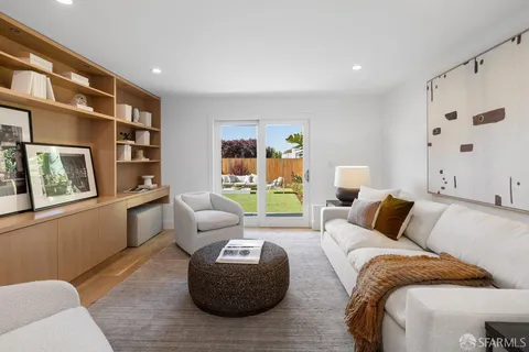 a living room with furniture and a couch