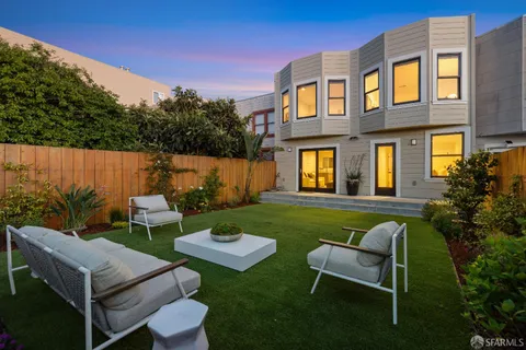 a view of a table and chairs in the patio