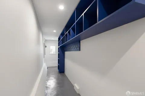 a view of a house with a door and a chair