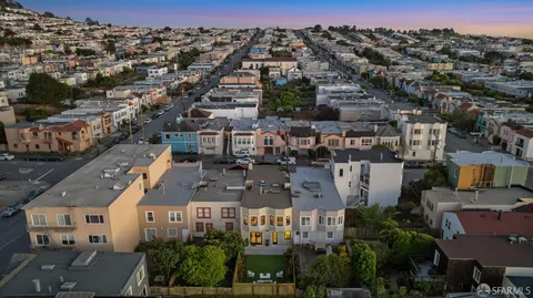 an aerial view of residential building and city view