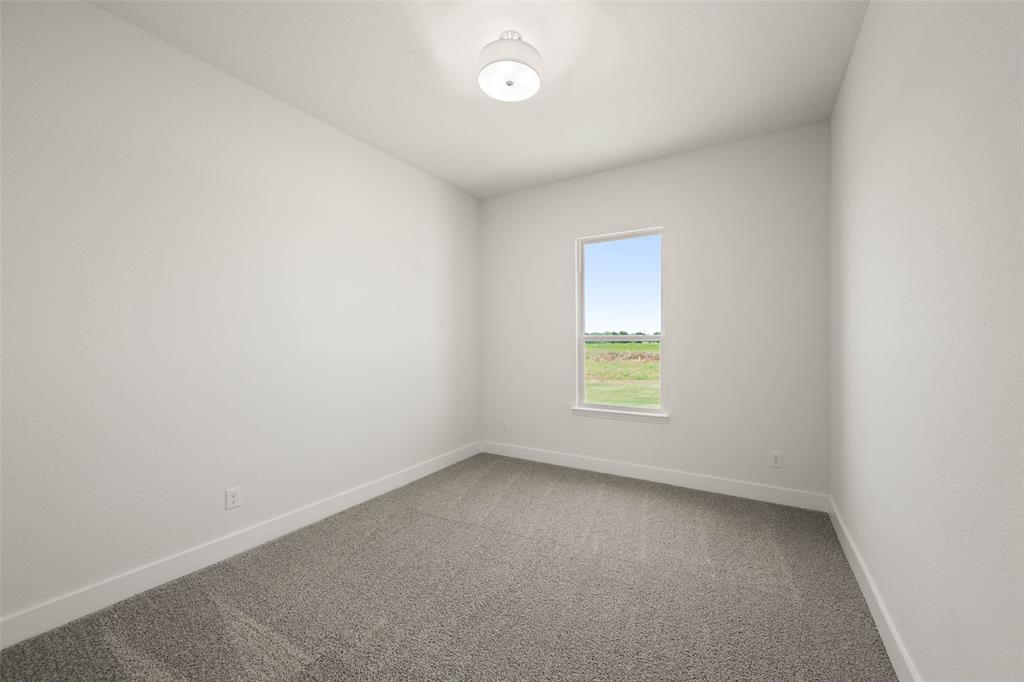 221 Olson Road Waxahachie, TX 75167 - Photo 14 of 24 an empty room with a window