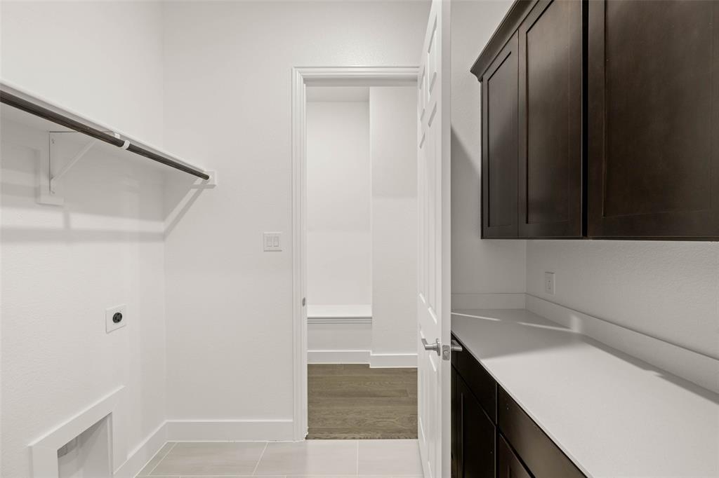 221 Olson Road Waxahachie, TX 75167 - Photo 17 of 24 a bathroom with a sink and a mirror