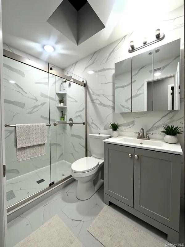 825 Ashford Street Brooklyn, NY 11207 - Photo 11 of 11 a bathroom with a toilet sink and shower