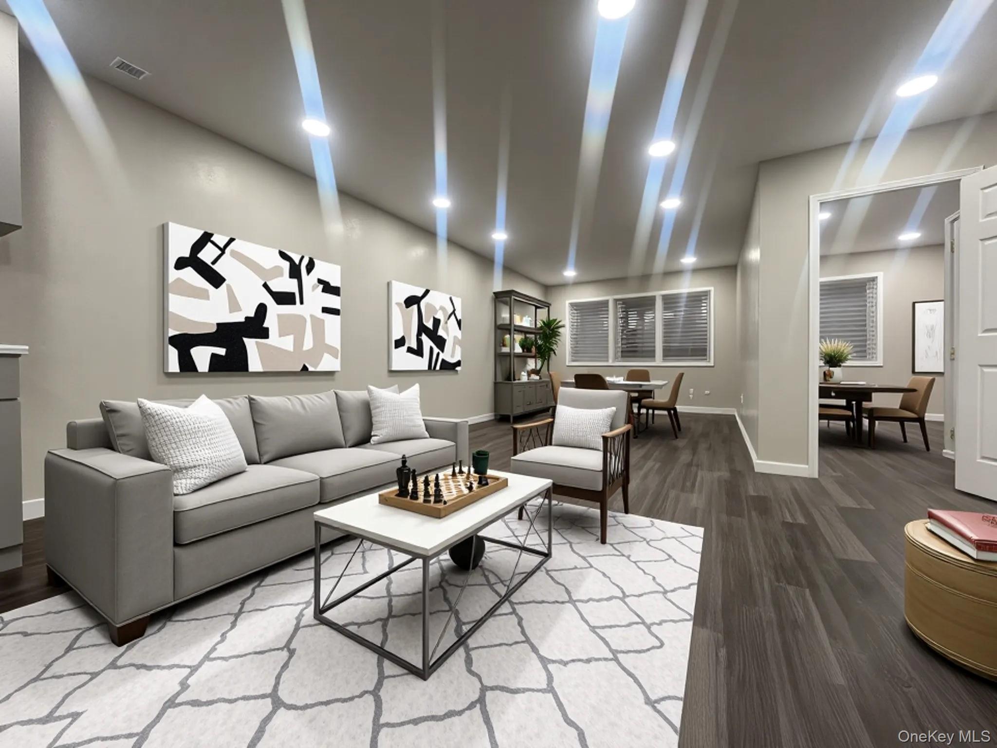 825 Ashford Street Brooklyn, NY 11207 - Photo 2 of 11 a living room with furniture and wooden floor