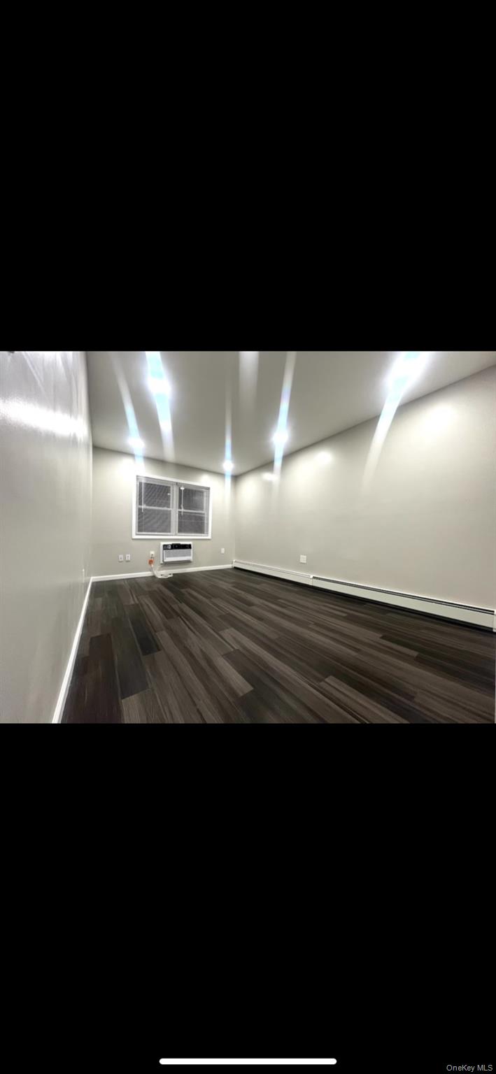 825 Ashford Street Brooklyn, NY 11207 - Photo 7 of 11 a view of car parked in a field