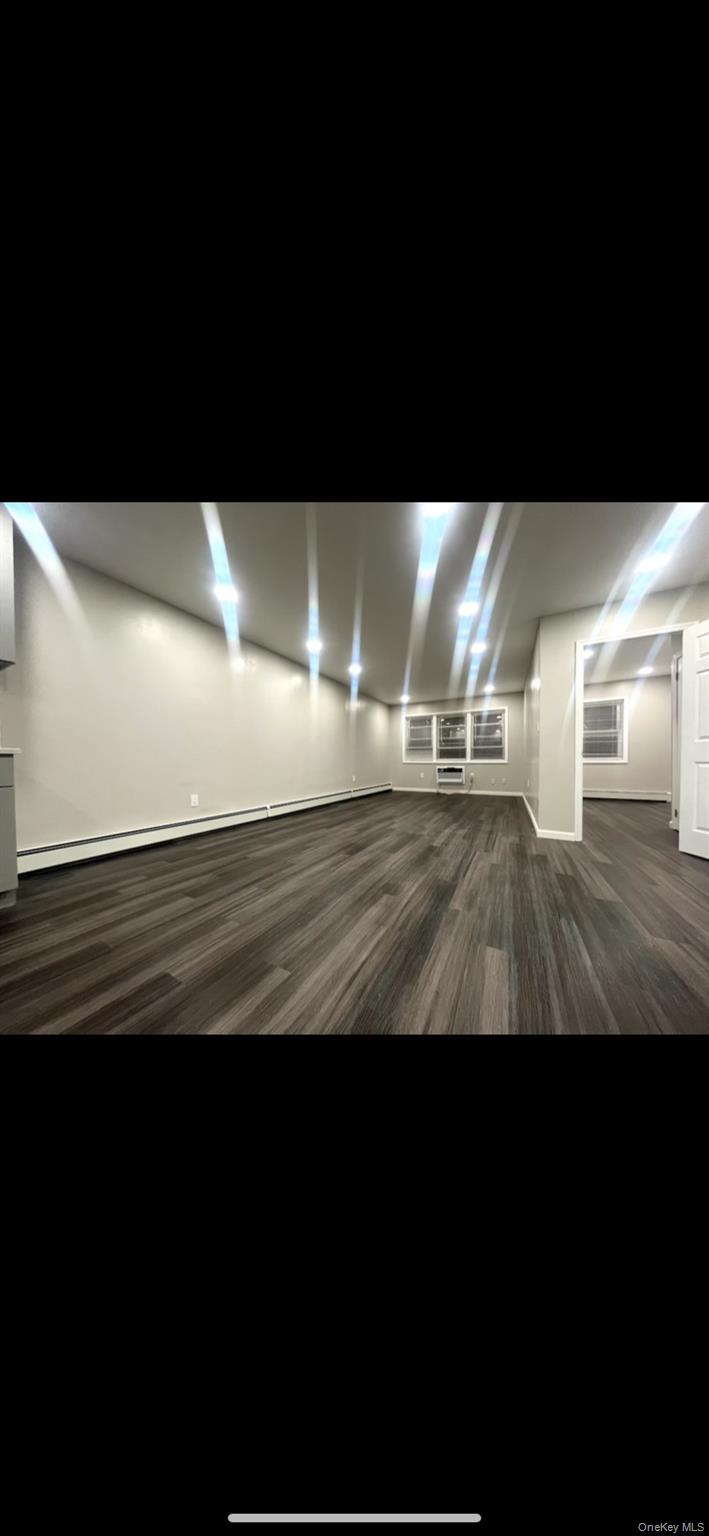 825 Ashford Street Brooklyn, NY 11207 - Photo 8 of 11 a view of lot of an outdoor space and window