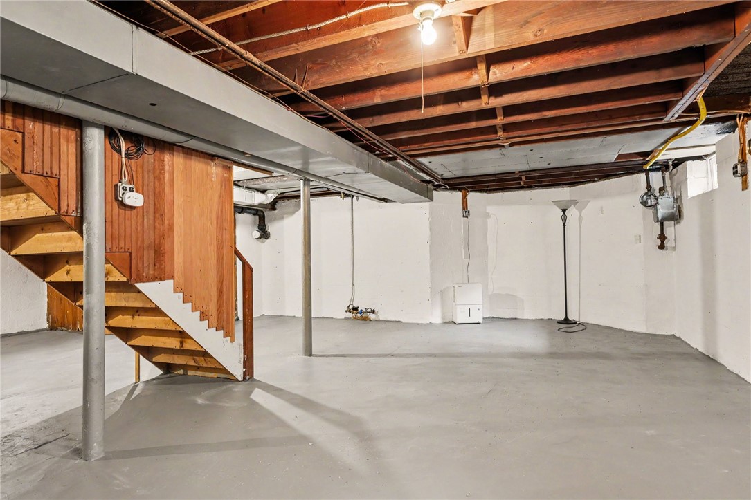 374 Ashbourne Road Brighton, NY 14618 - Photo 23 of 33 Full basement with washer and dryer.