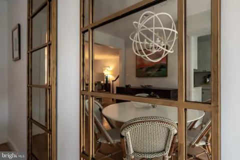 a view of a door and chair in the patio