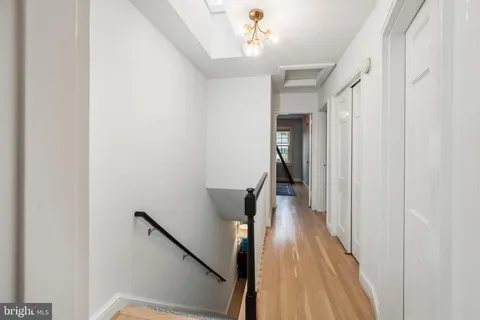 a bed room with a bed and window