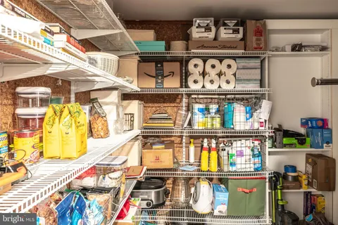 a backyard view with sitting space and trees