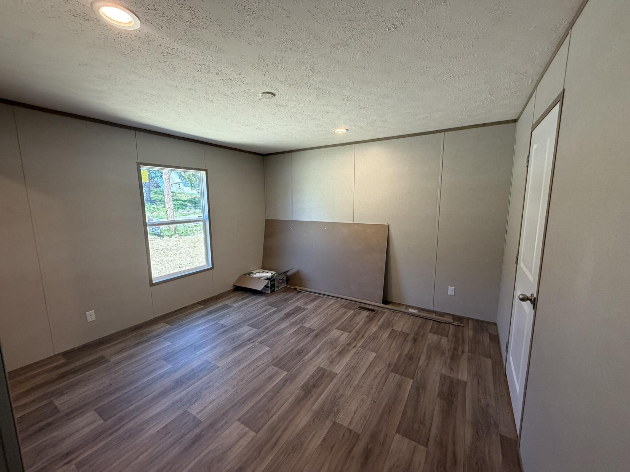 110 West Cedar Grove Road Irvine, KY 40336 - Photo 12 of 31 Enjoy nearly 200 square feet of private space in the owner's bedroom, offering plenty of room for a king-size bed, additional furniture, and a comfortable retreat!
