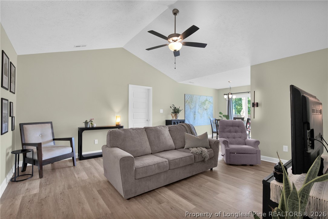 351 Sandy Grove Road Parkton, NC 28371 - Photo 6 of 30 a living room with furniture and a flat screen tv