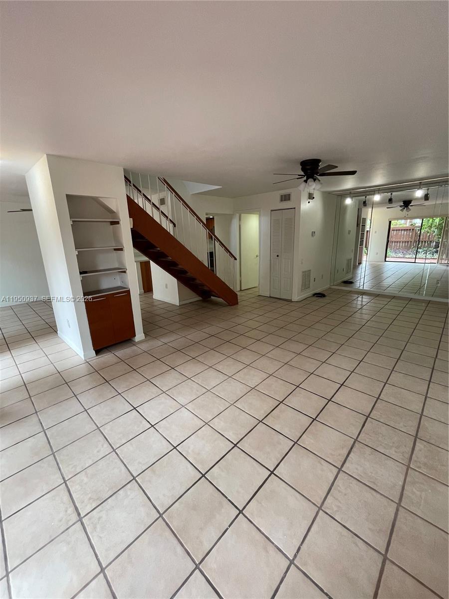 6425 Southwest 116th Place, Unit E Miami, FL 33173 - Photo 7 of 16 a view of a livingroom with furniture