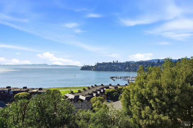 a kitchen with granite countertop a sink and a window